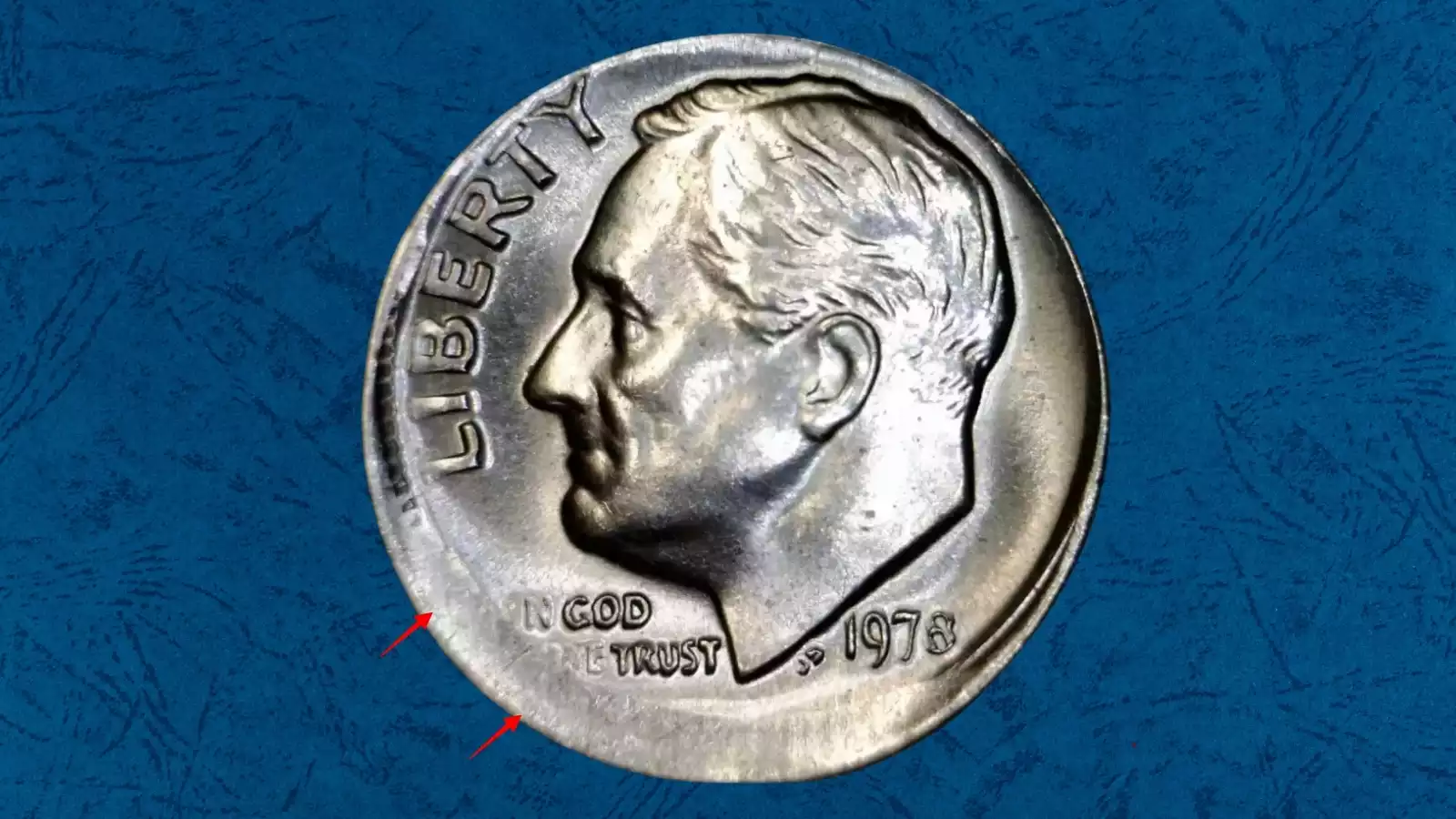 1978 Roosevelt dime off-center strike error showing crescent-shaped blank area with shifted design