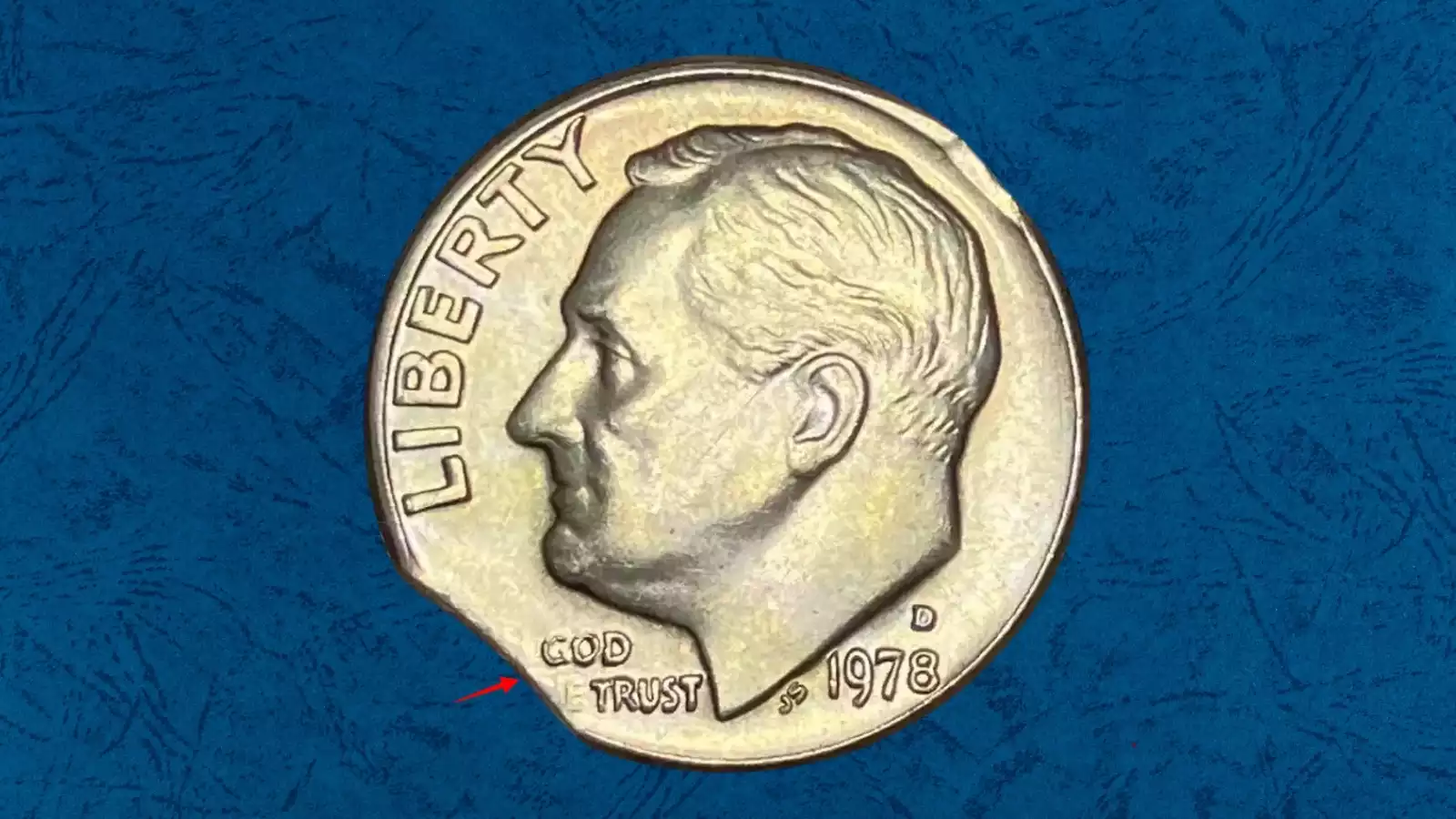 1978 Roosevelt dime clipped planchet error showing crescent-shaped missing section on the coin edge